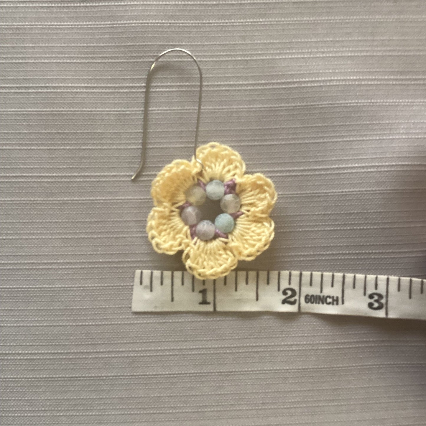 Crocheted flower earrings made with cotton thread and agate, beads, yellow, and purple