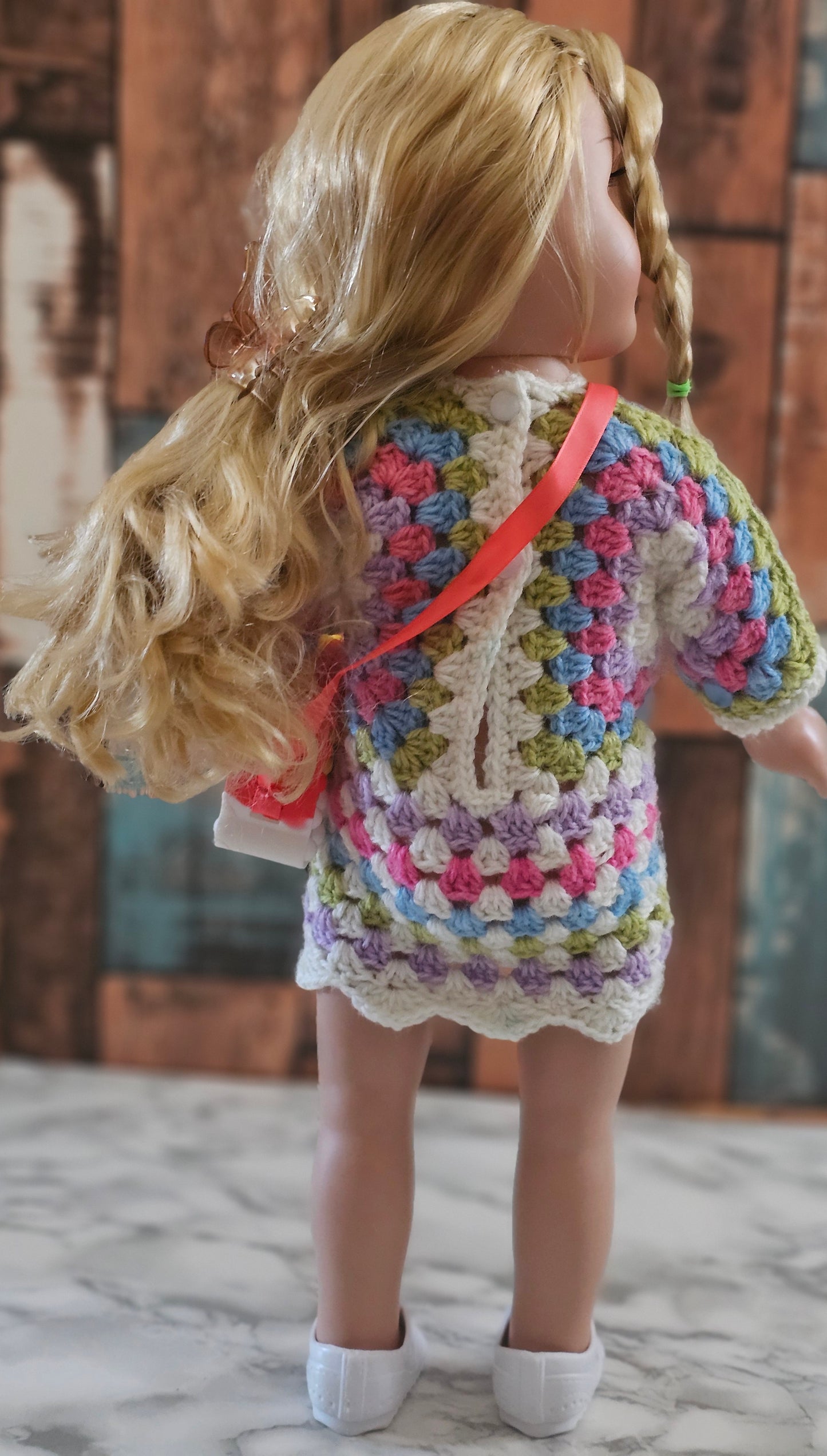 crochet doll dress in colors white pink purple blue and green