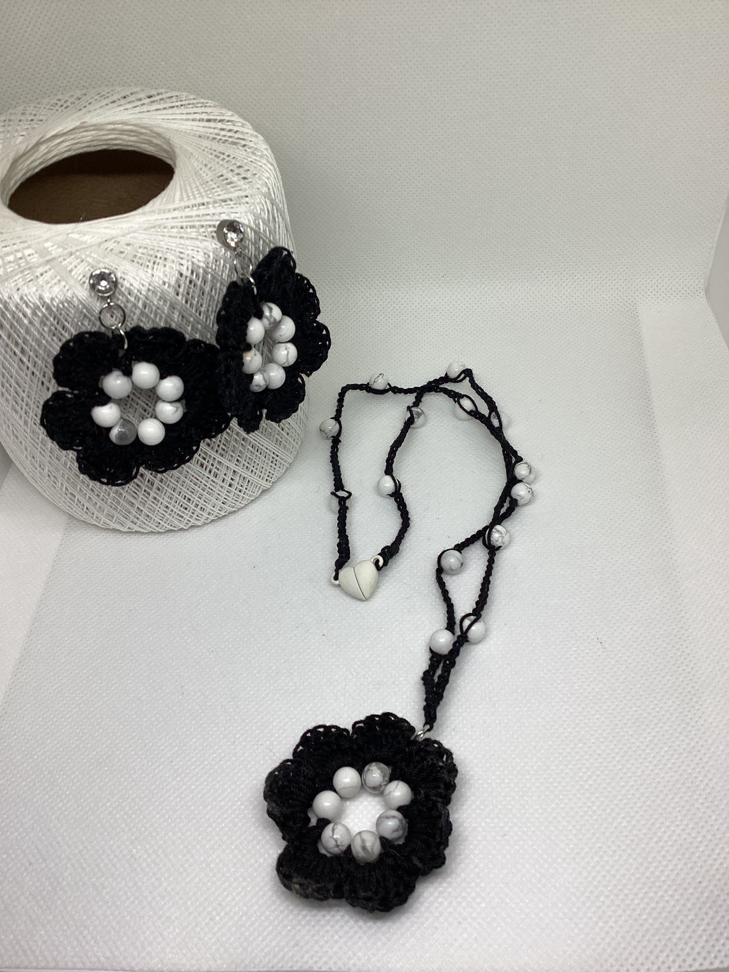 Black cotton floral necklace with white beads