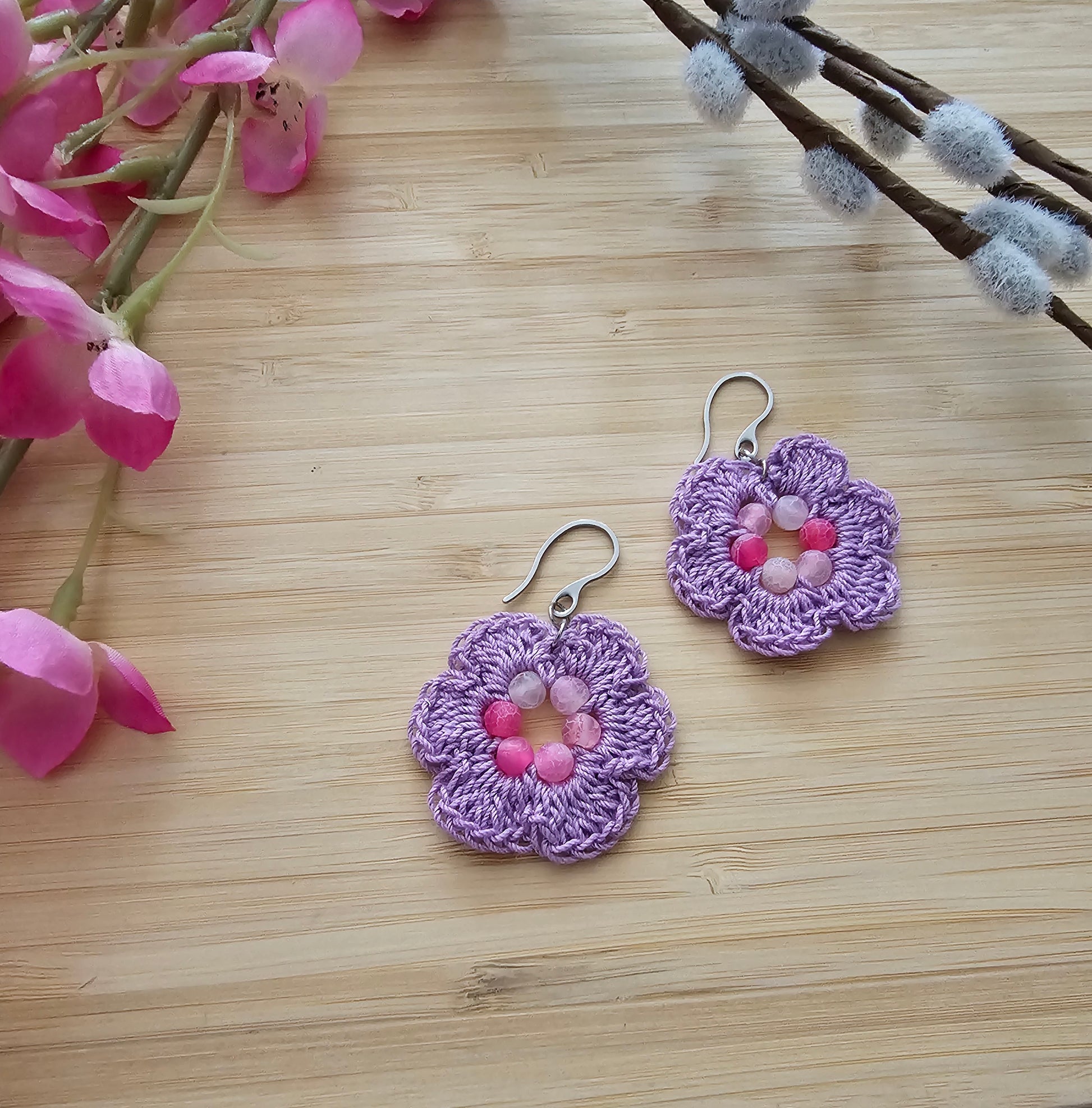 Crocheted flower earrings made with cotton thread and a gate beads