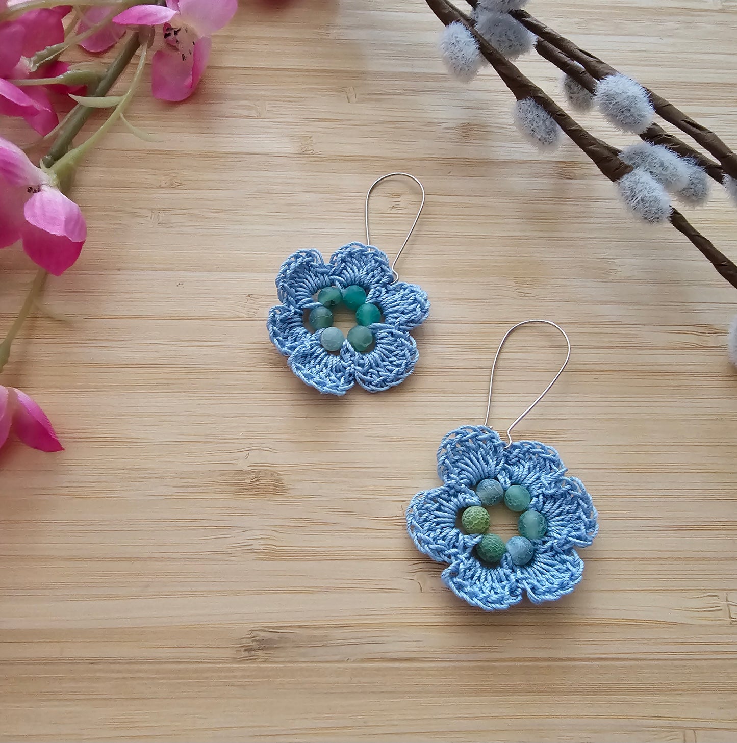 Crocheted flower earrings made with cotton thread and agate beads colour blue