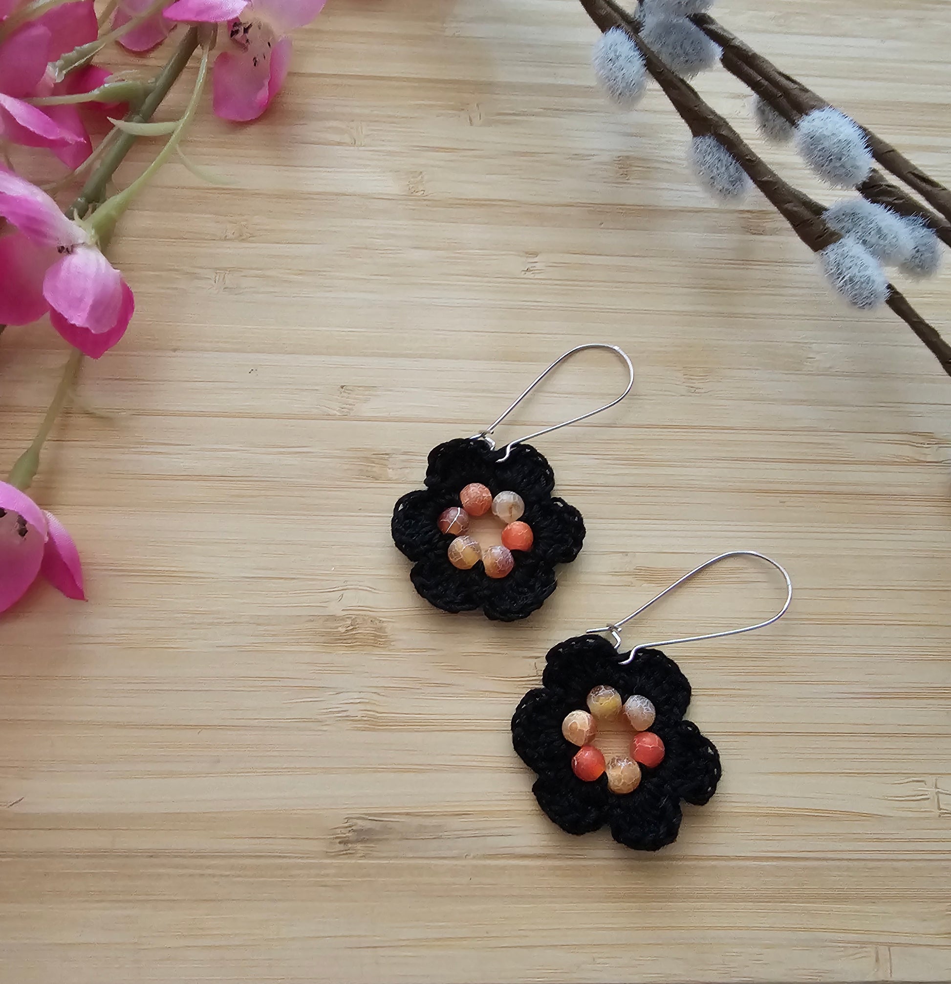 Crocheted flower earrings, black and orange made with cotton thread and Agate beads