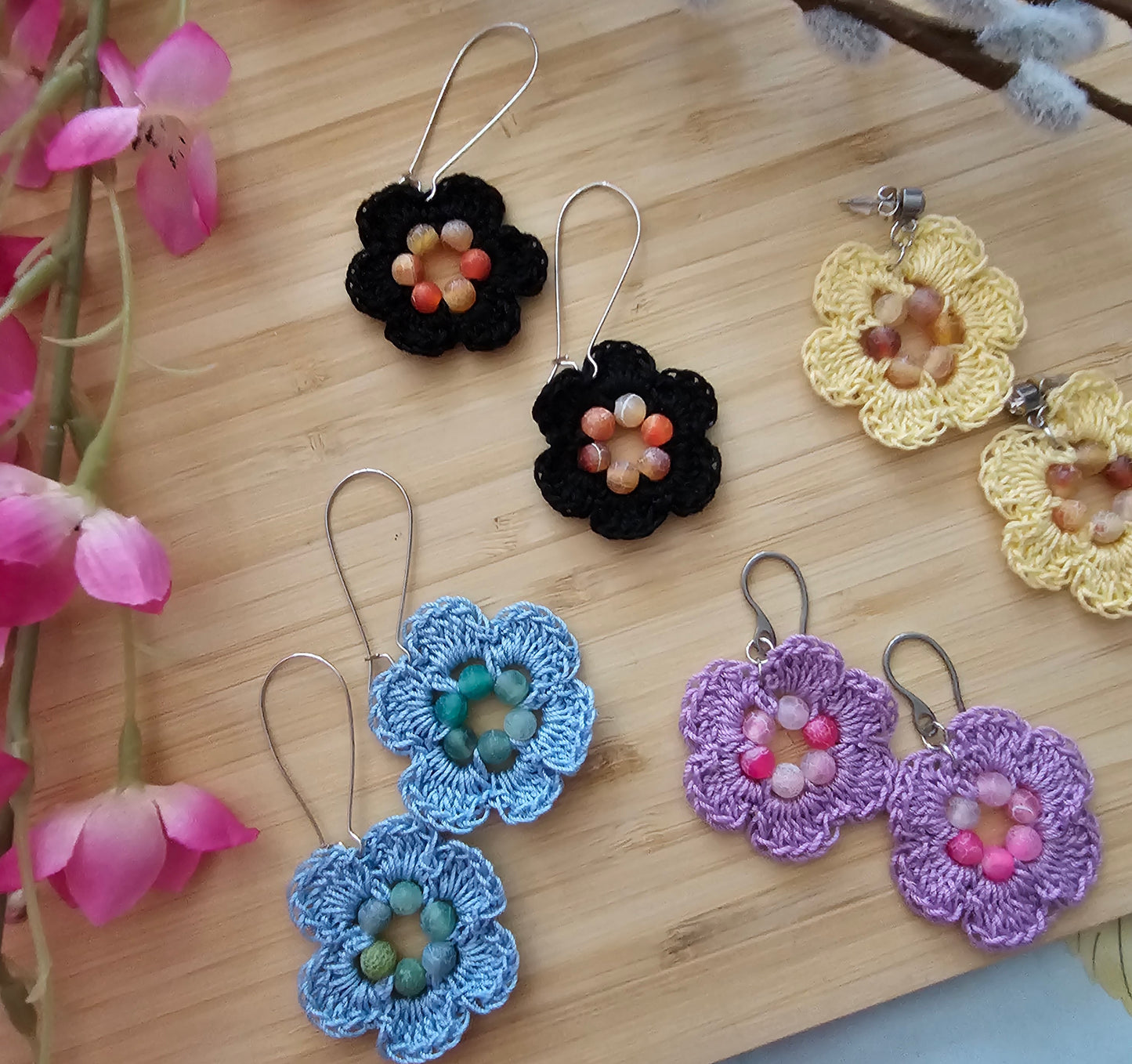 Crocheted flower earrings made with cotton thread and agate, beads, yellow, and purple