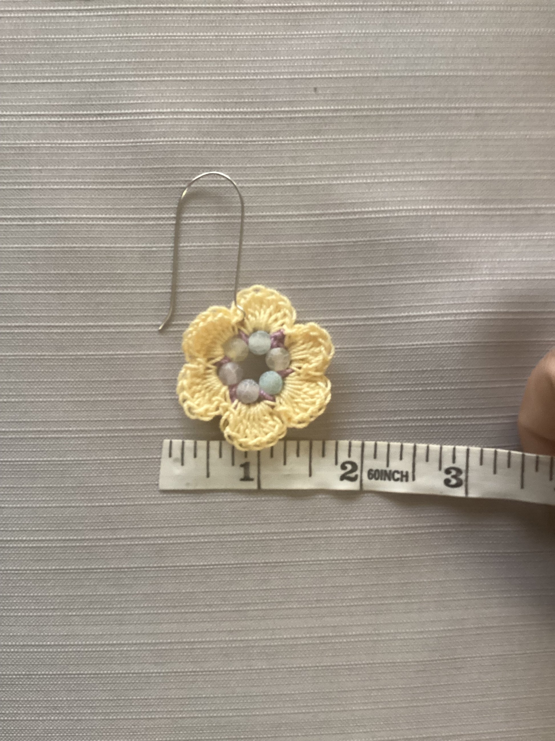 Crocheted flower earrings made with cotton thread and agate, beads, yellow, and purple