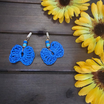 beaded bow earrings blue made with green clay beads and gold earring findings  and a bamboo crocheted bow 