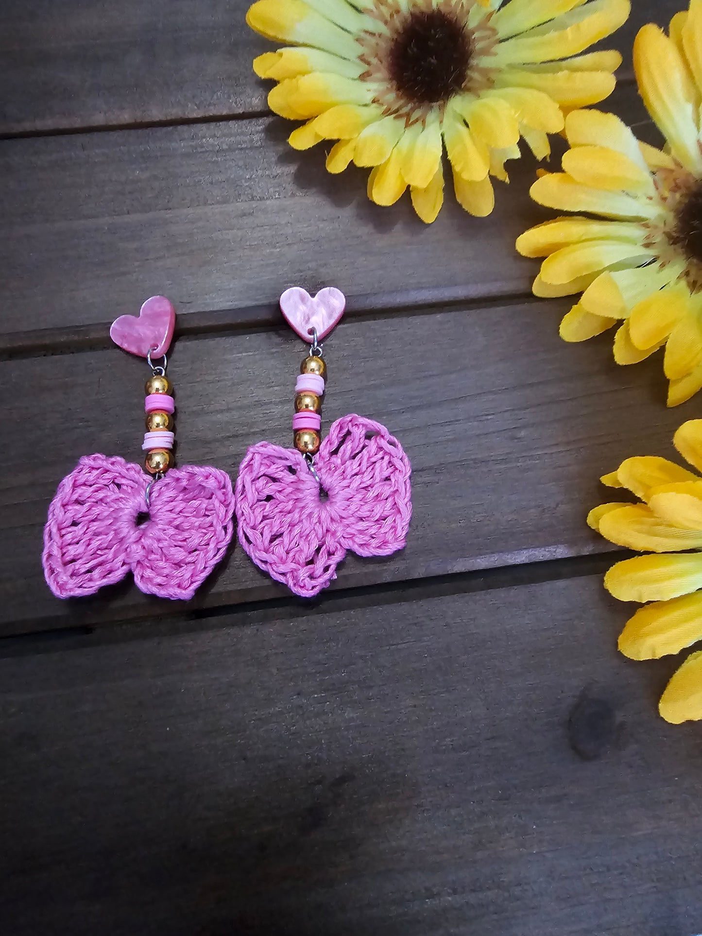 beaded bow earrings green made with green clay beads and pink heart earring findings  and a bamboo crocheted bow 