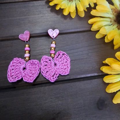 beaded bow earrings green made with green clay beads and pink heart earring findings  and a bamboo crocheted bow 