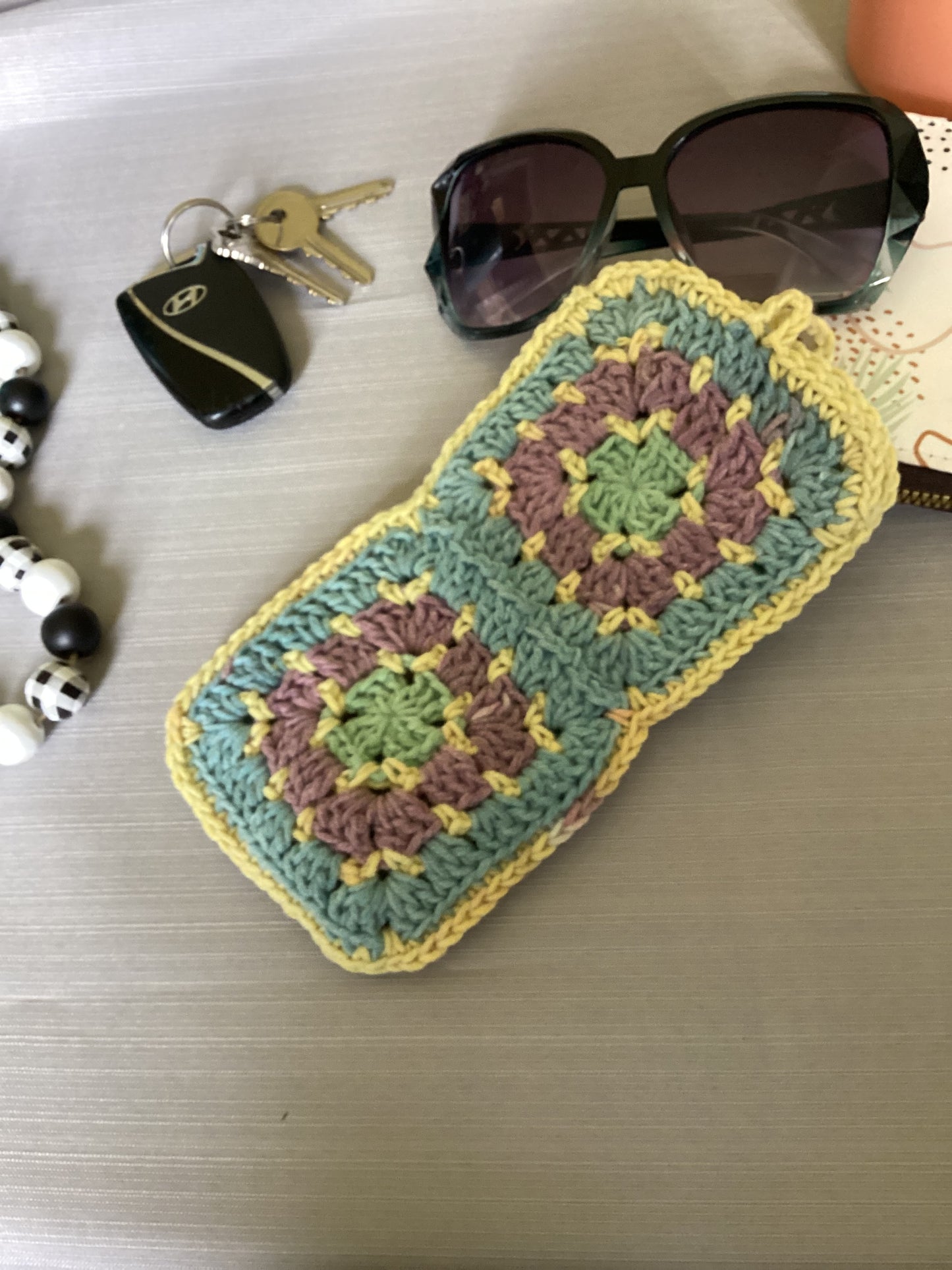 Chic Sun glass case purple, yellow green made of cotton granny square, crochet soft case