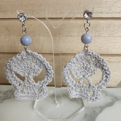 skull earrings gray with purple beads