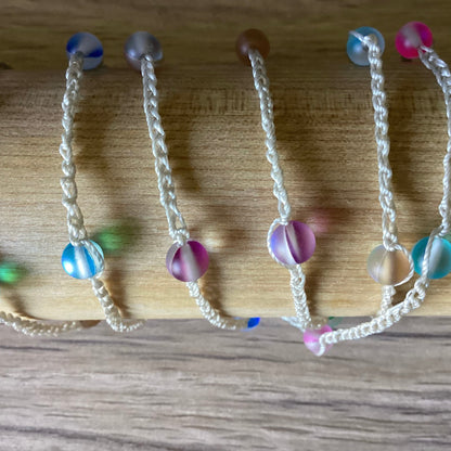 Crocheted  wrap/bracelet made with frosted glass multicolored beads